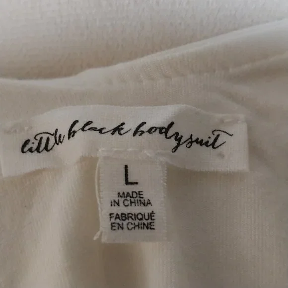 LITTLE BLACK BODYSUIT SIZE L CREAM WHITE This OFF SHOULDER RUFFLE THONG BODYSUIT - Picture 9 of 12